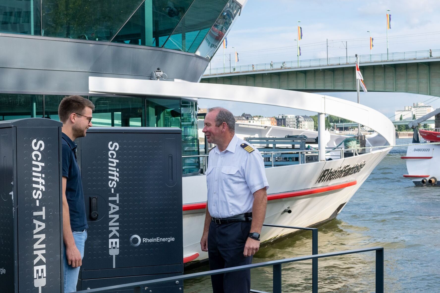 Captain and staff at the ship's dock with shore power
