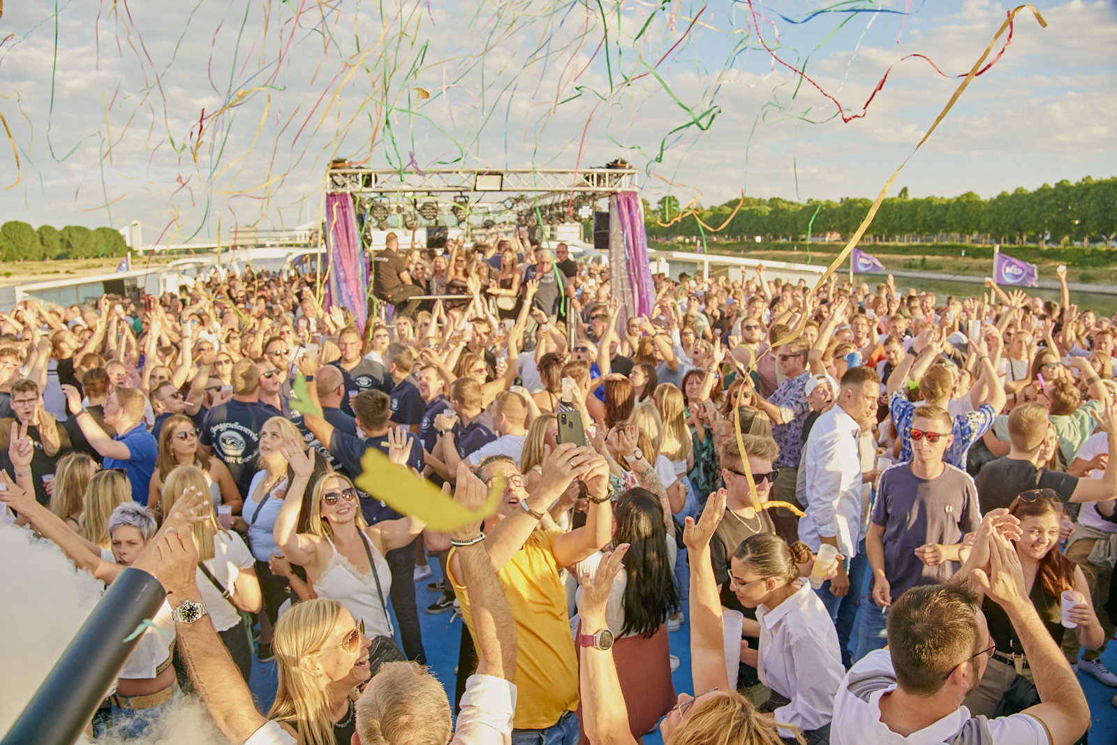 People celebrating on the open-air deck