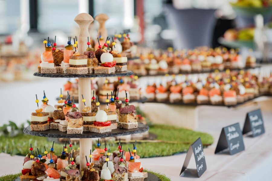 Various small savory snacks on an etagere
